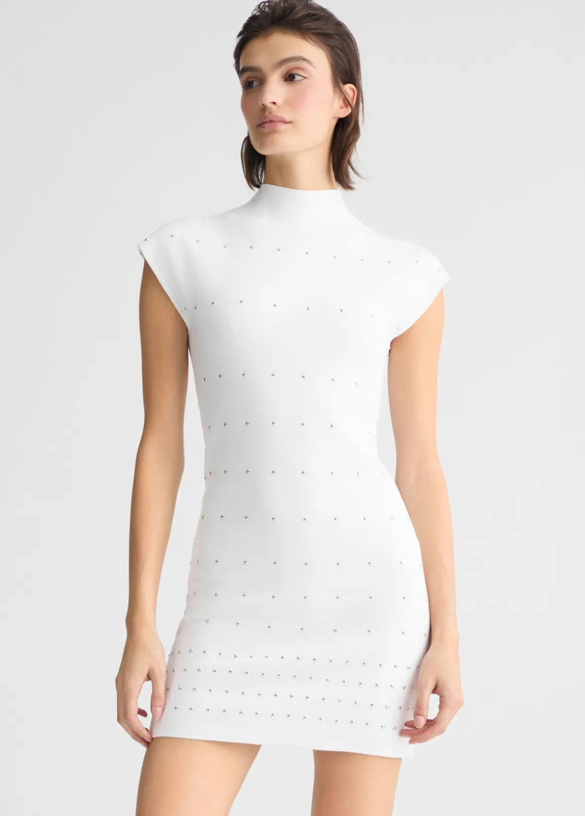 Abito in maglia con borchie