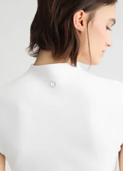 Abito in maglia con borchie