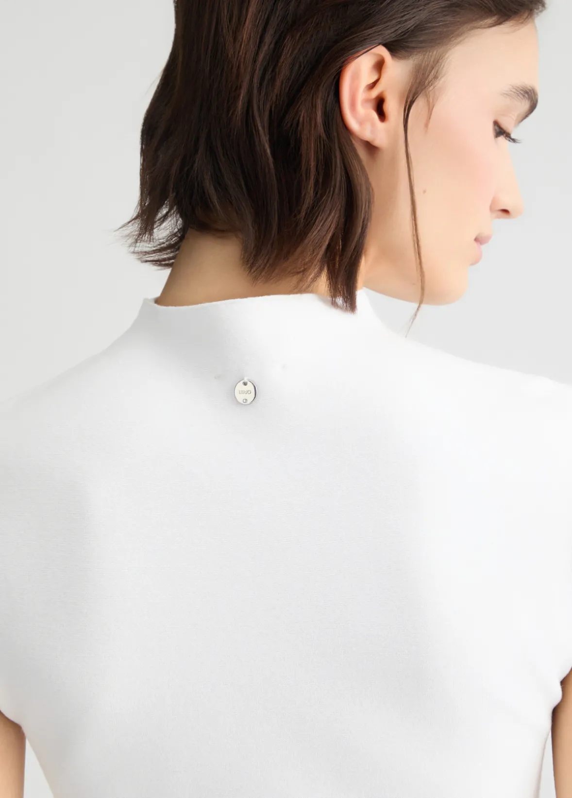 Abito in maglia con borchie