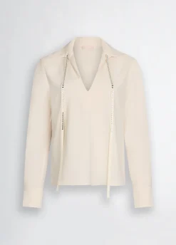 Blusa con strass