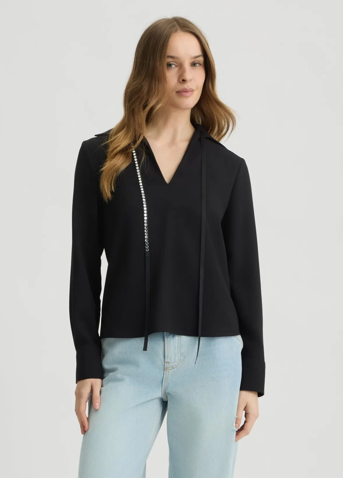 Blusa con strass