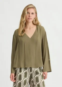 Blusa in crêpe