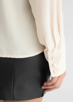 Camicia con pieghe