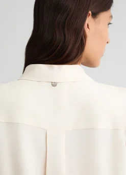 Camicia con pieghe