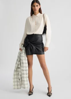Camicia con pieghe