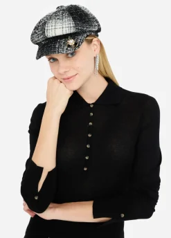 Cappello check con spilla