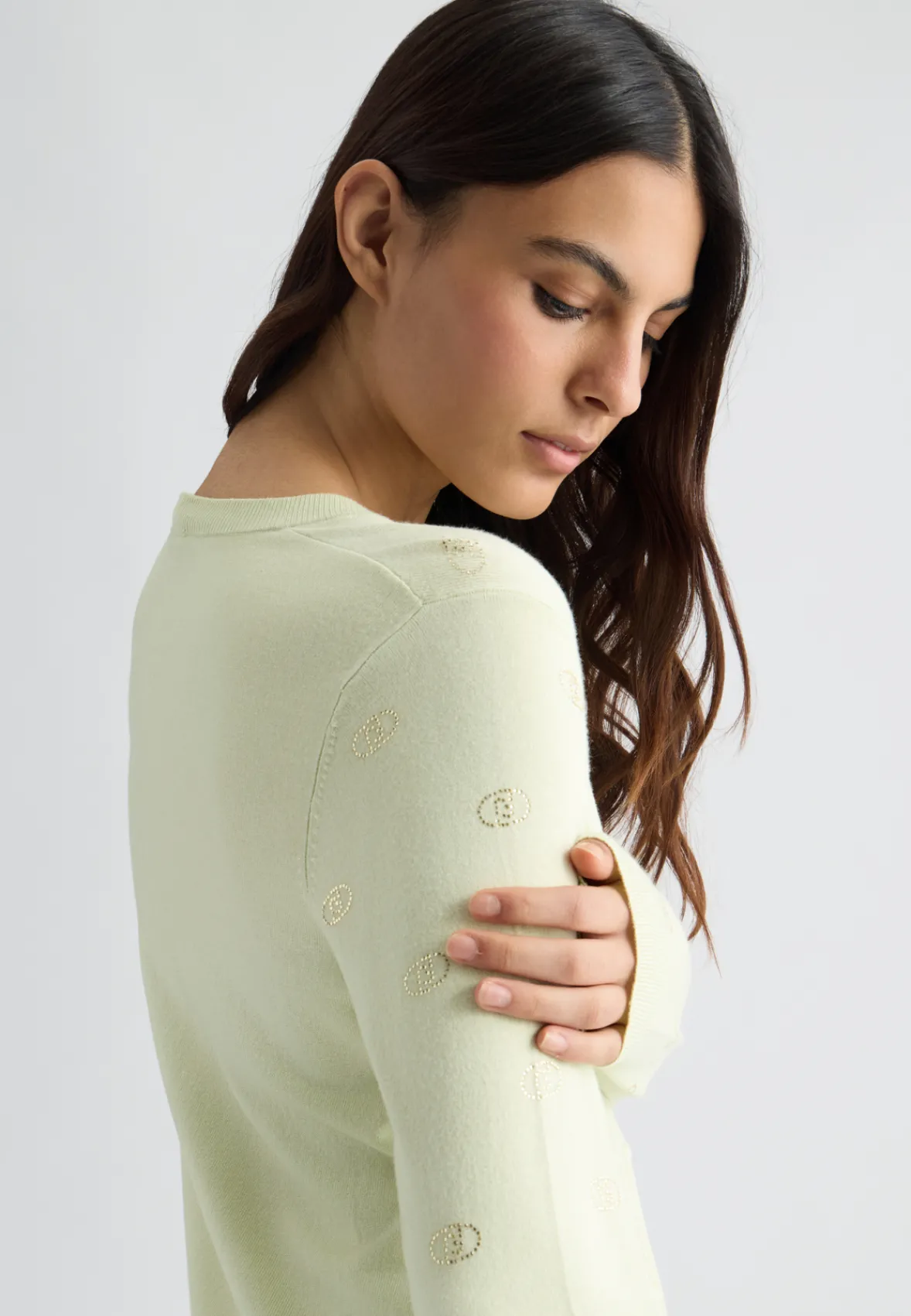 Cardigan con logo e strass
