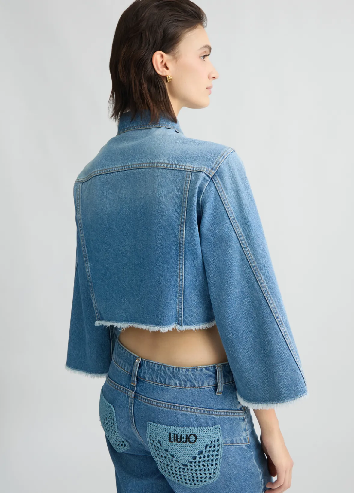 Giacca cropped in denim