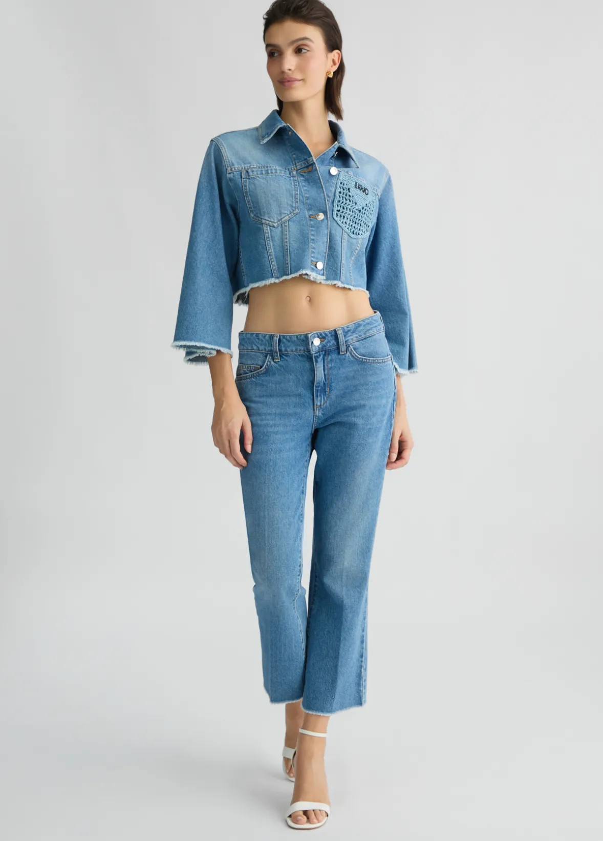 Giacca cropped in denim