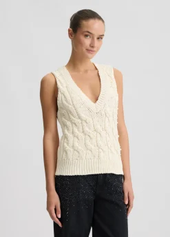 Gilet con perle