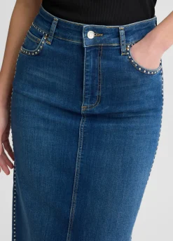 Gonna in denim con borchie