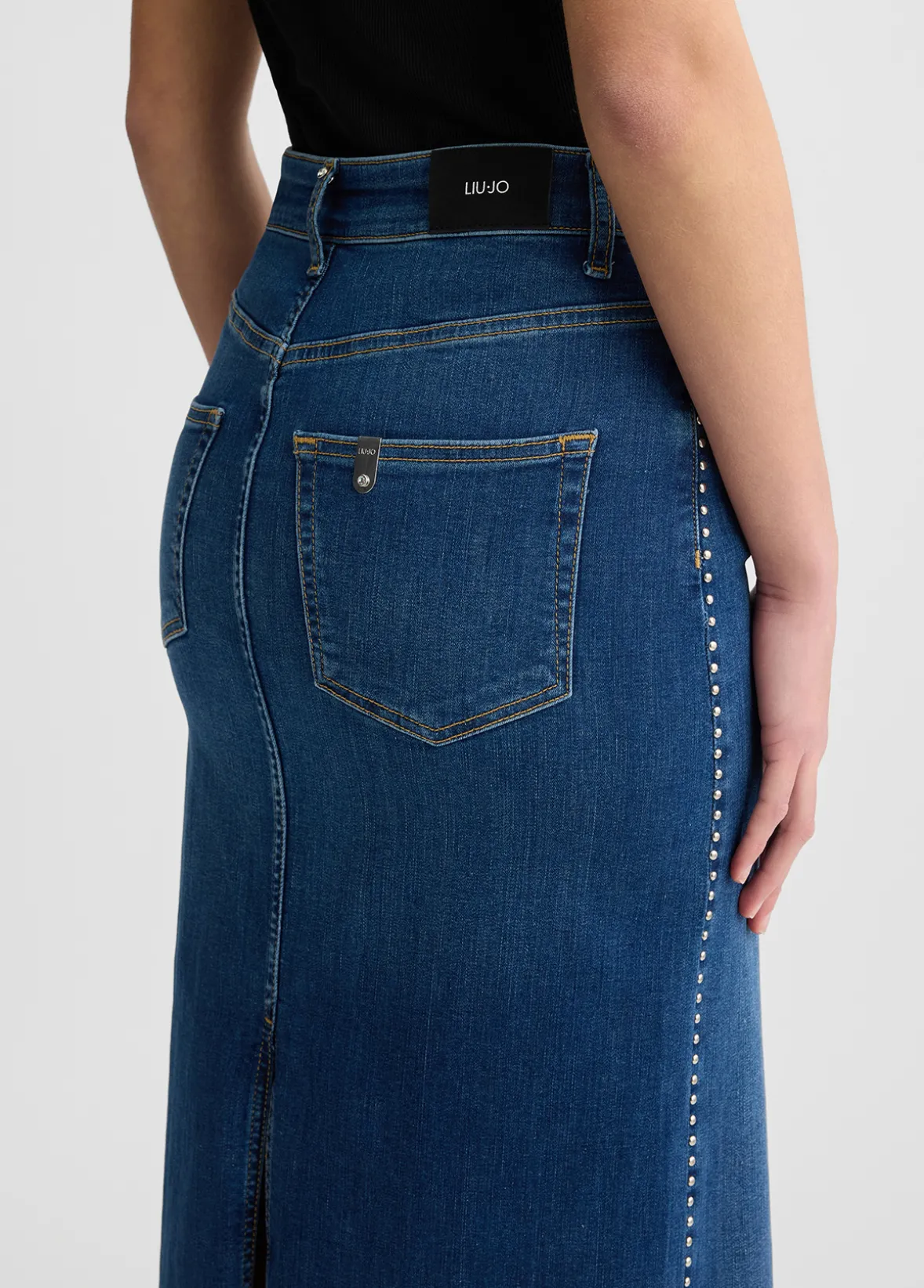 Gonna in denim con borchie