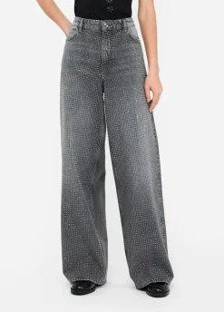 Jeans baggy con borchie