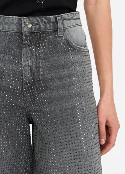 Jeans baggy con borchie