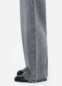 Jeans baggy con borchie