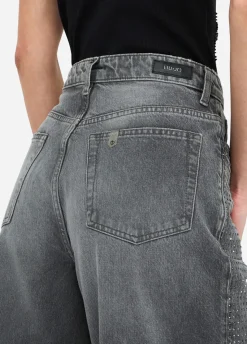 Jeans baggy con borchie