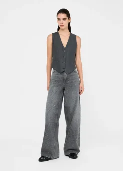 Jeans baggy con borchie