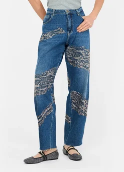 Jeans balloon con borchie e strass