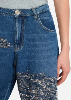 Jeans balloon con borchie e strass