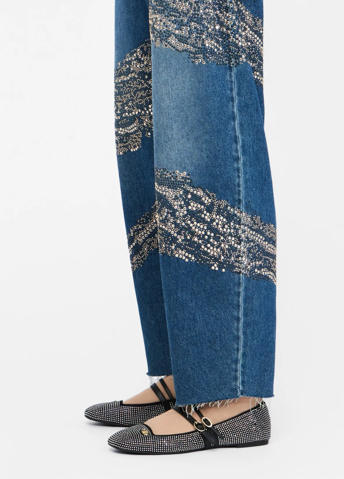 Jeans balloon con borchie e strass