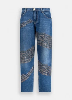Jeans balloon con borchie e strass