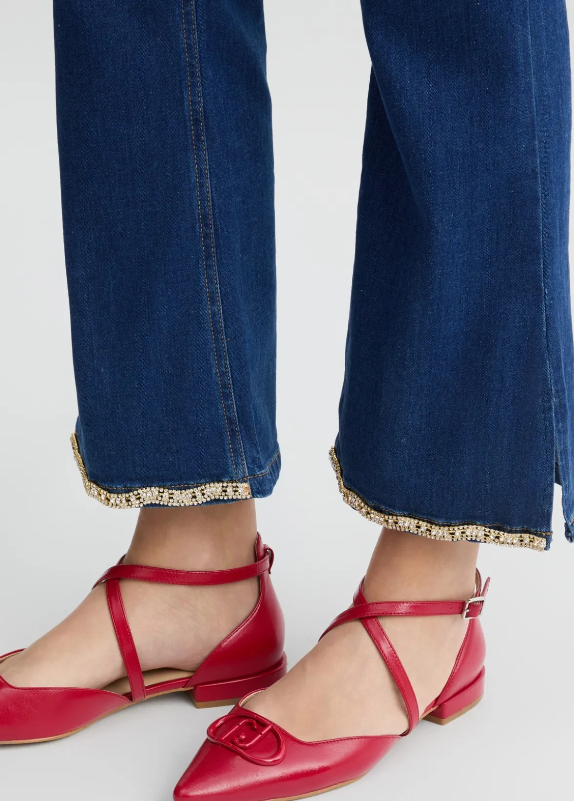 Jeans bootcut con strass