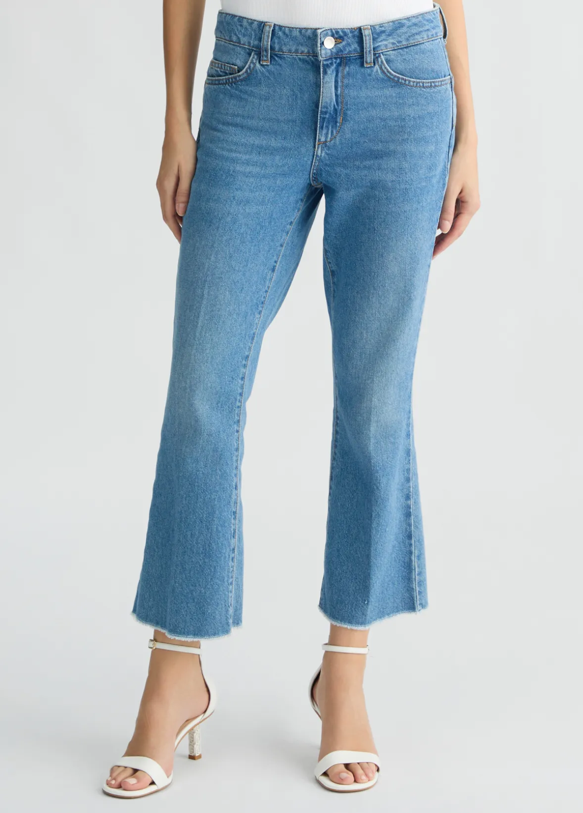 Jeans bootcut con tasche crochet
