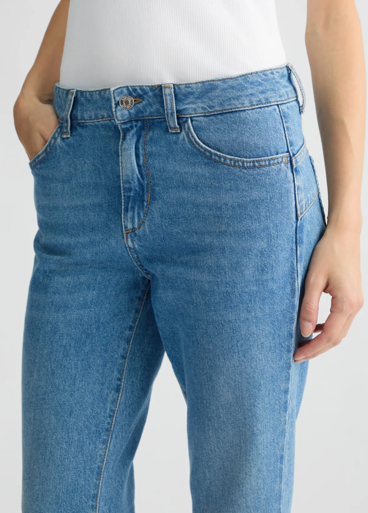 Jeans bootcut con tasche crochet