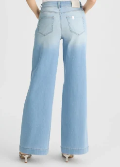 Jeans flare con borchie