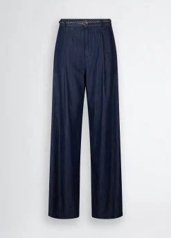 Jeans flare con pinces