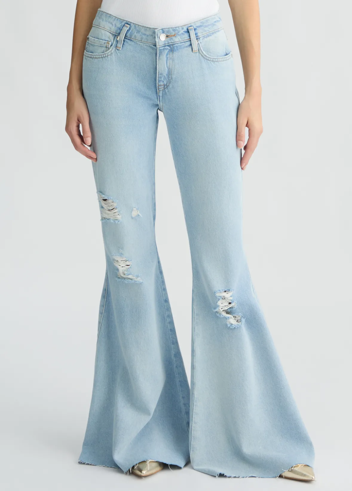 Jeans flare con strappi