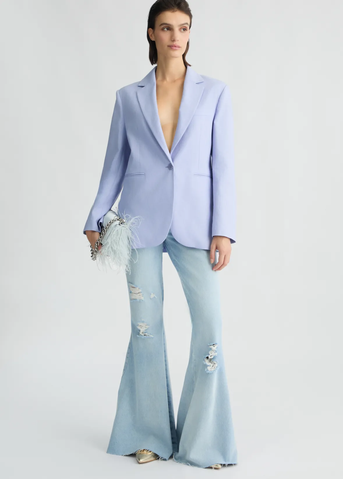 Jeans flare con strappi