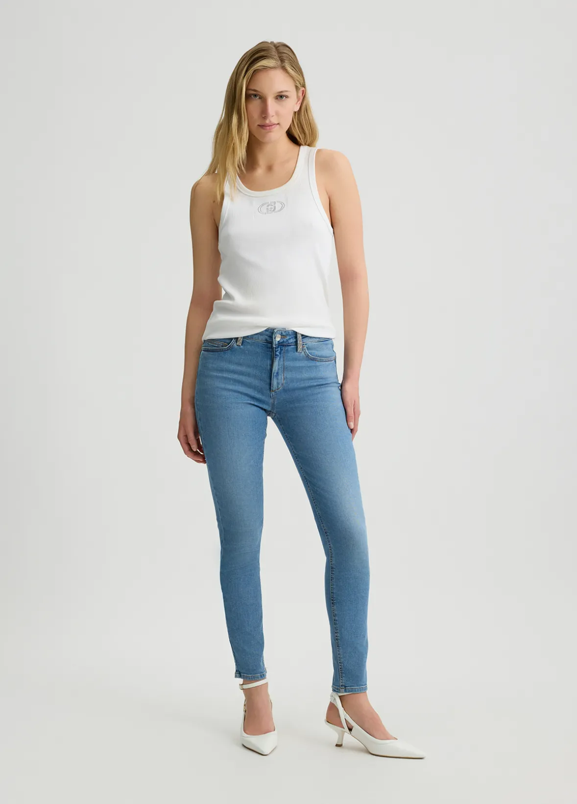 Jeans skinny bottom up con strass