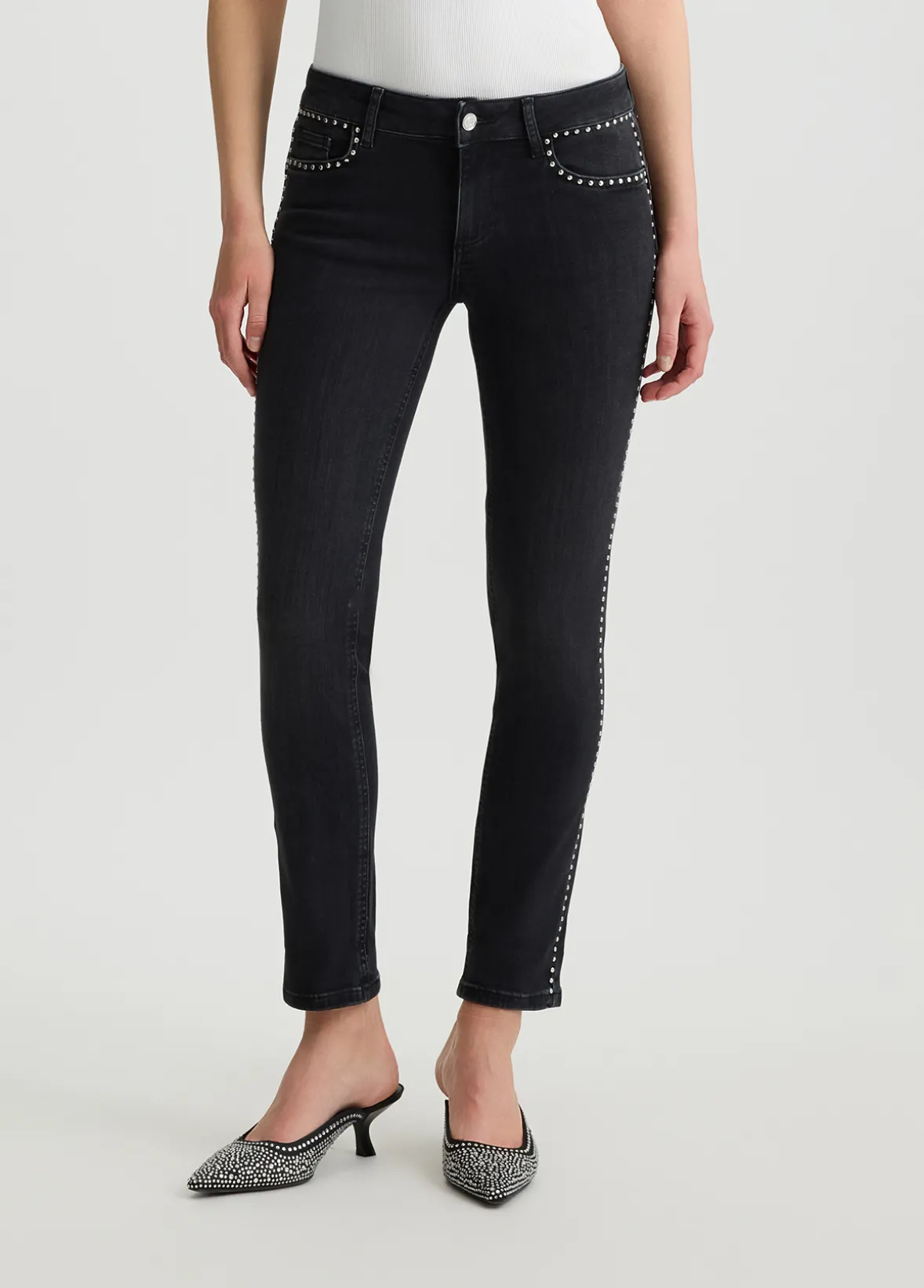 Jeans skinny con borchie