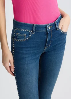 Jeans skinny con borchie