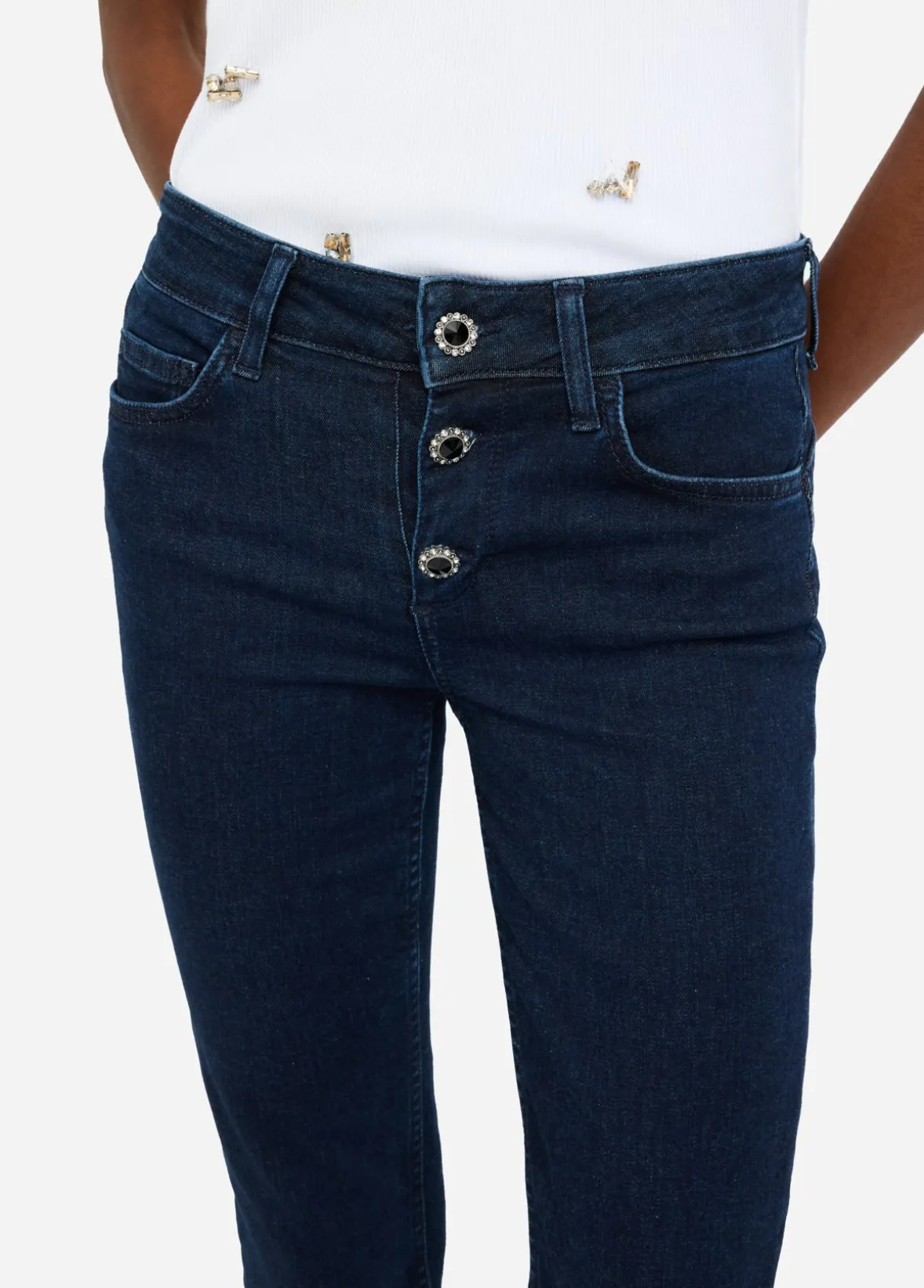 Jeans skinny con risvolto