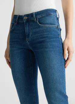 Jeans skinny con risvolto