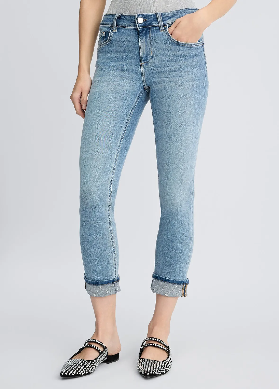 Jeans skinny con risvolto
