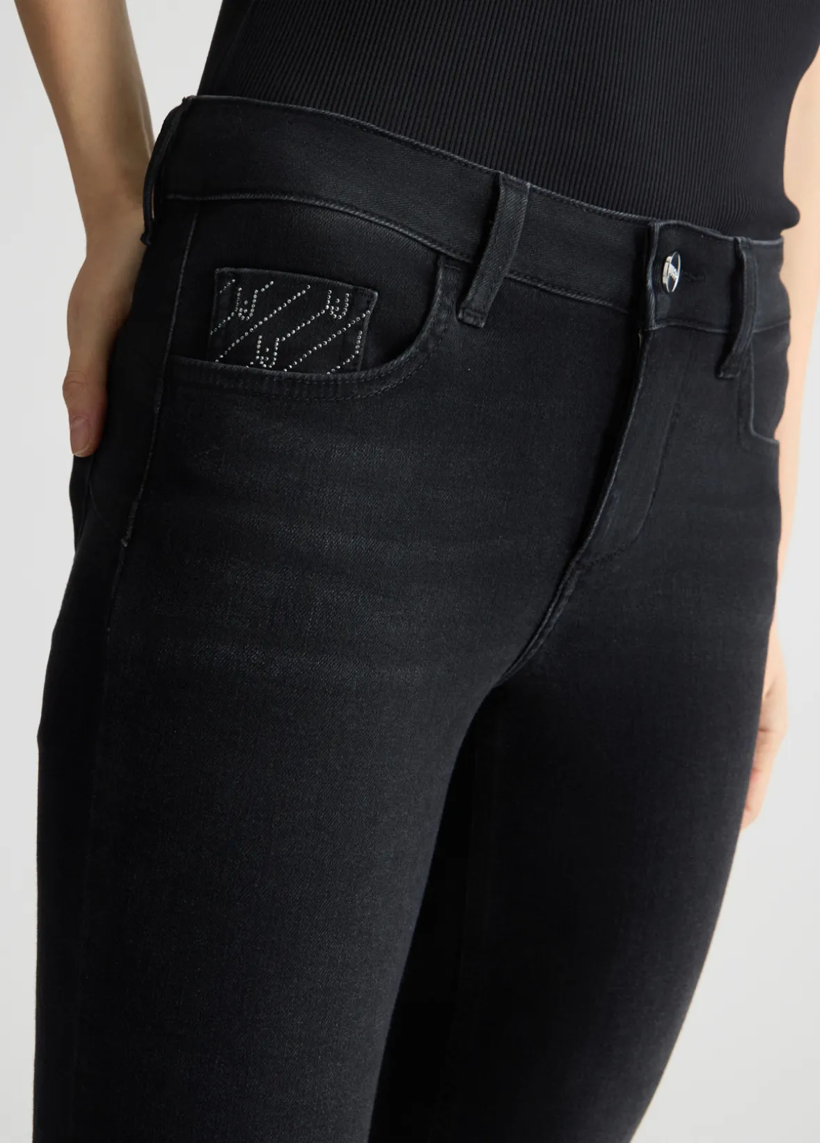 Jeans skinny con spacchetti