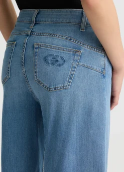 Jeans super flare con cintura