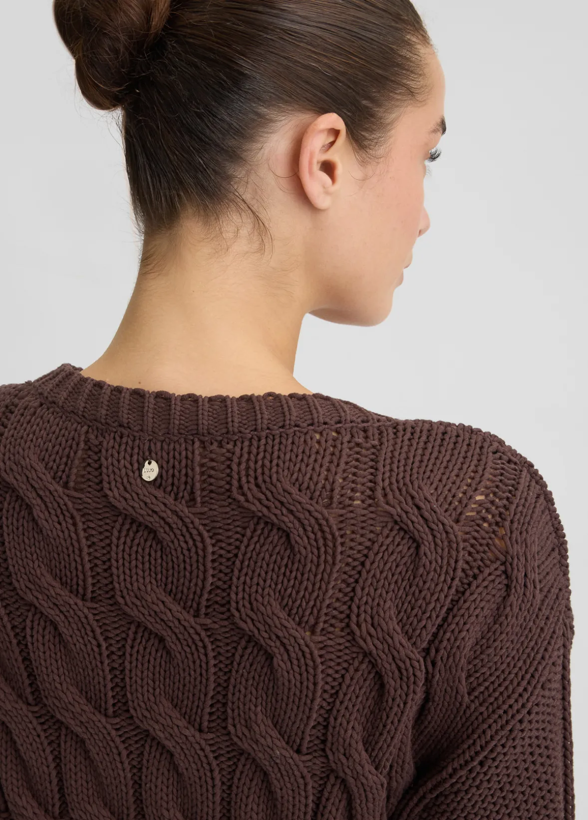 Maglione a trecce