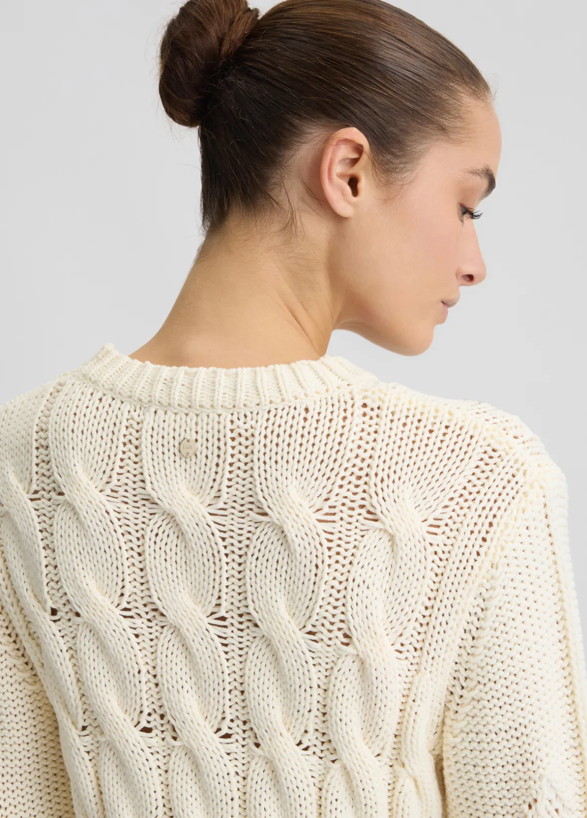 Maglione in cotone a trecce