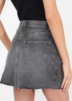 Minigonna in denim con borchie