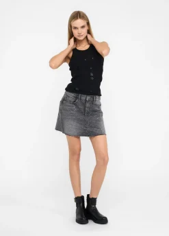 Minigonna in denim con borchie
