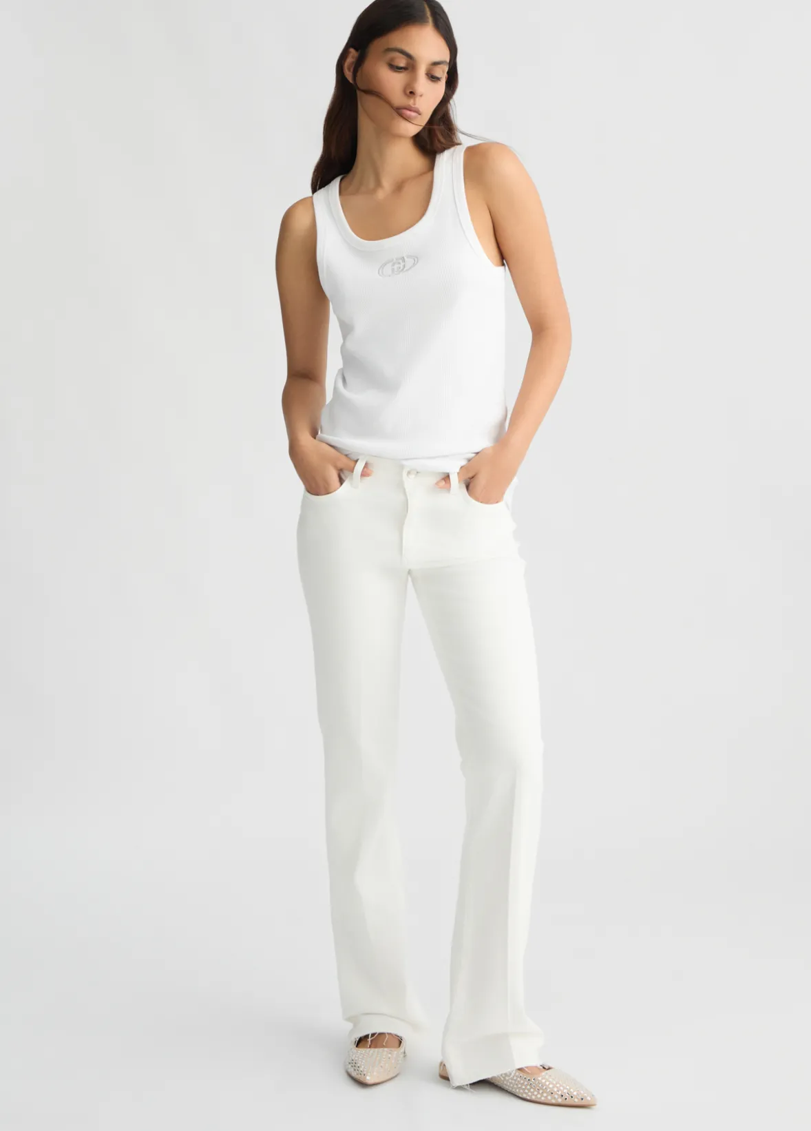 Pantaloni bootcut con logo strass