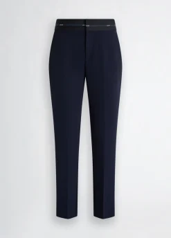 Pantaloni con cintone logato