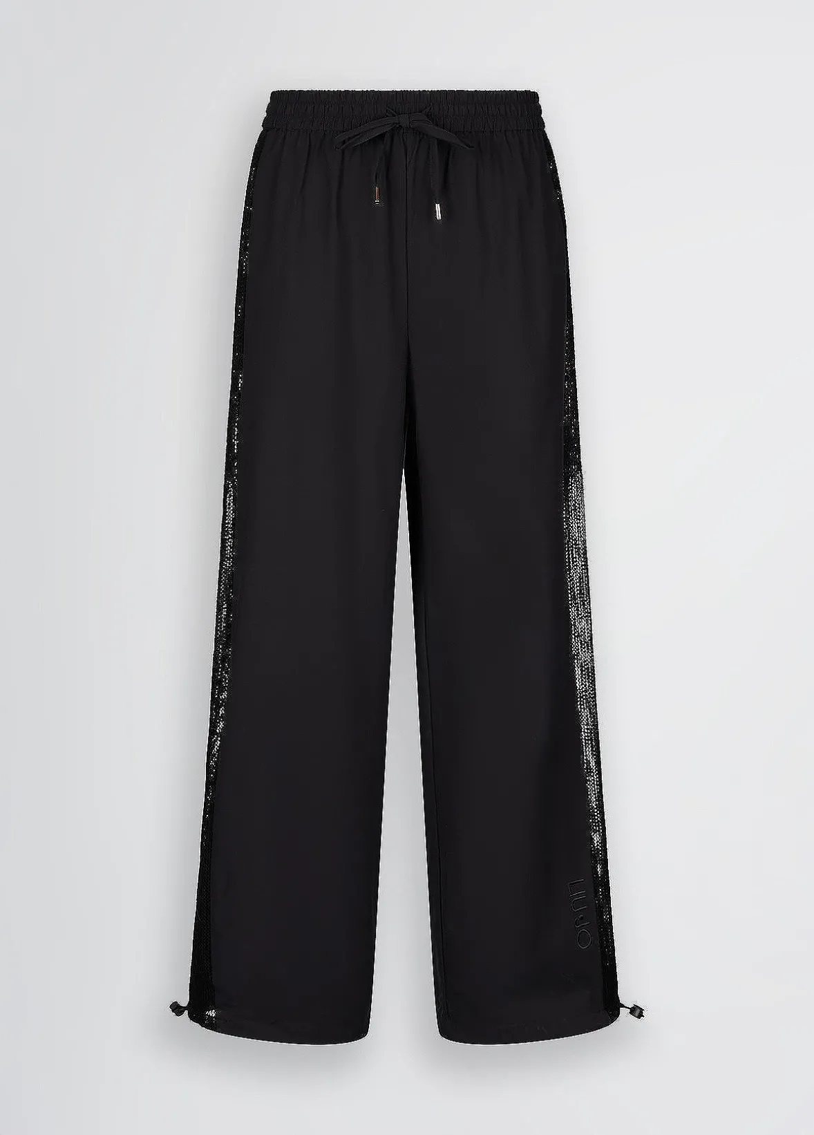 Pantaloni con inserto in rete