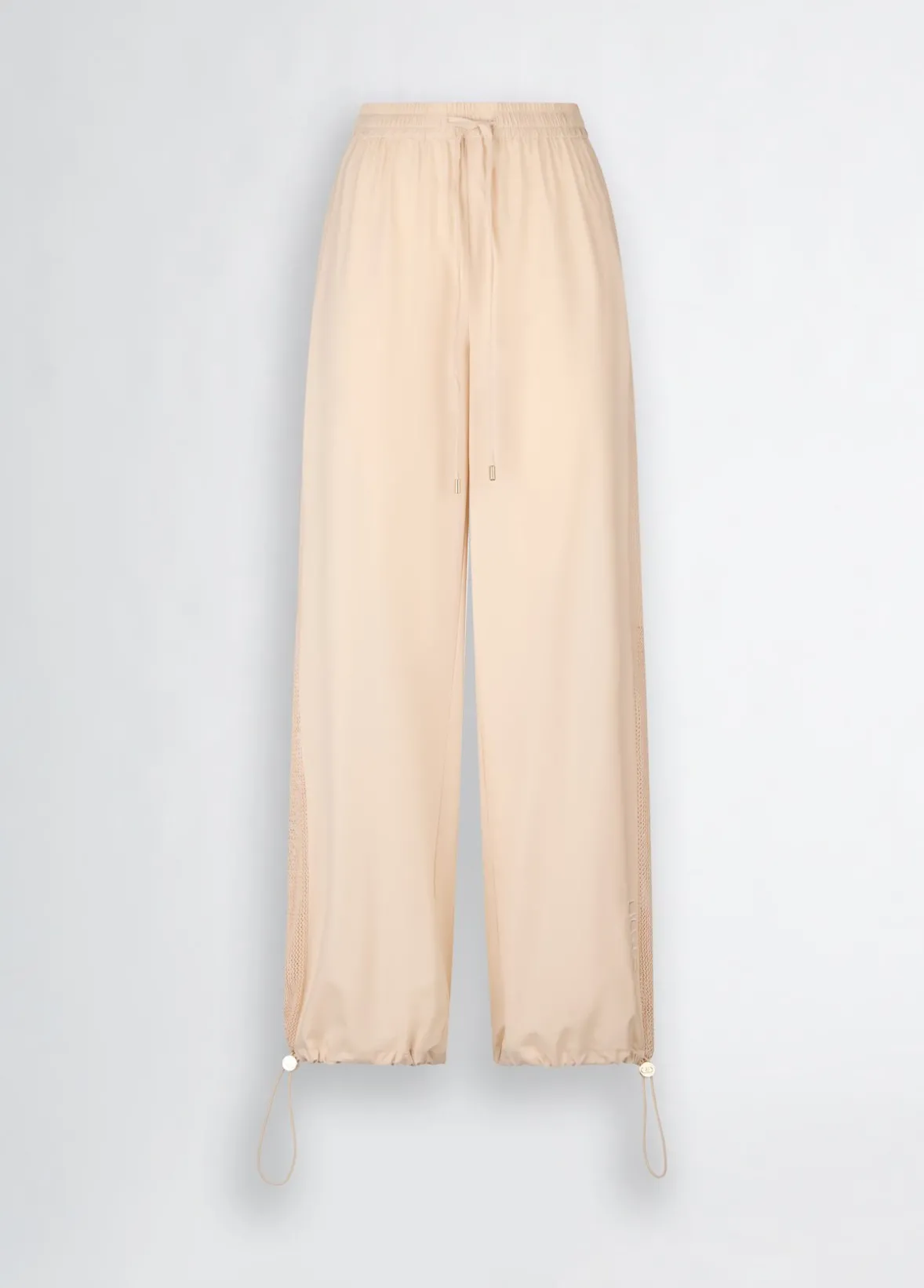 Pantaloni con inserto in rete