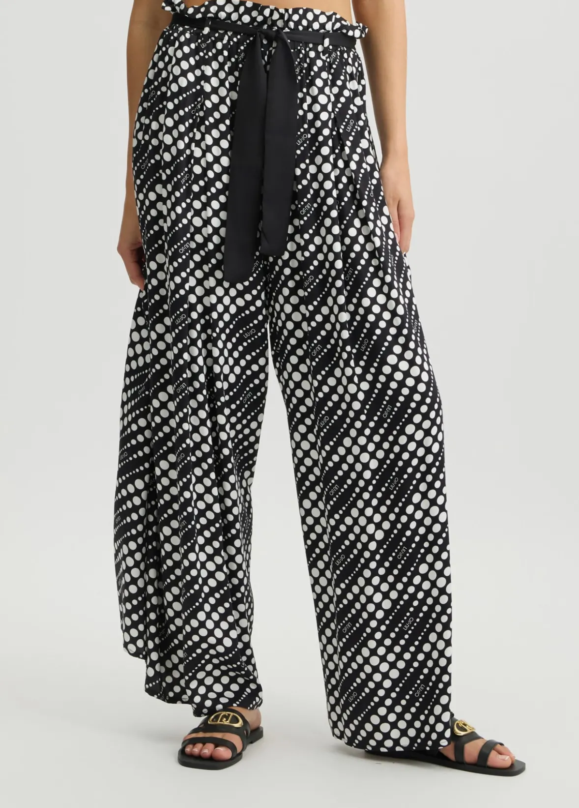 Pantaloni con stampa a pois