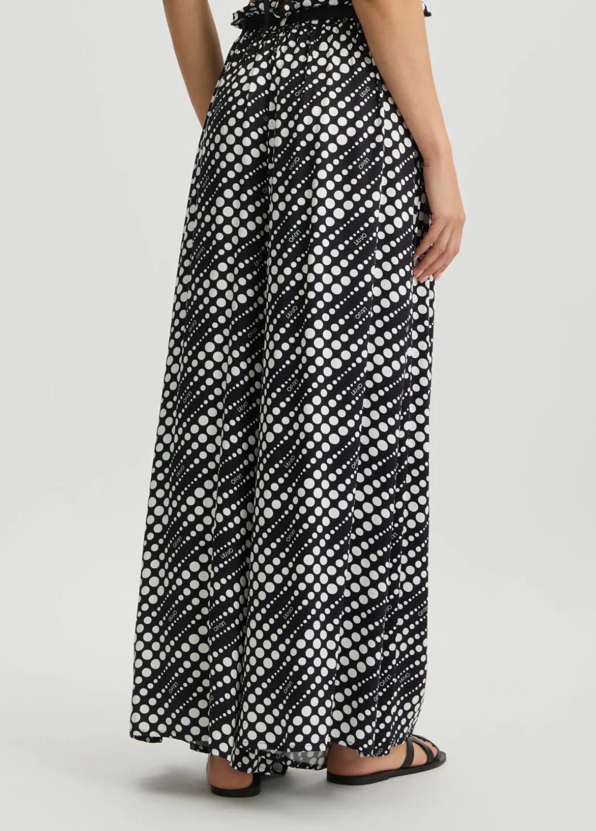 Pantaloni con stampa a pois